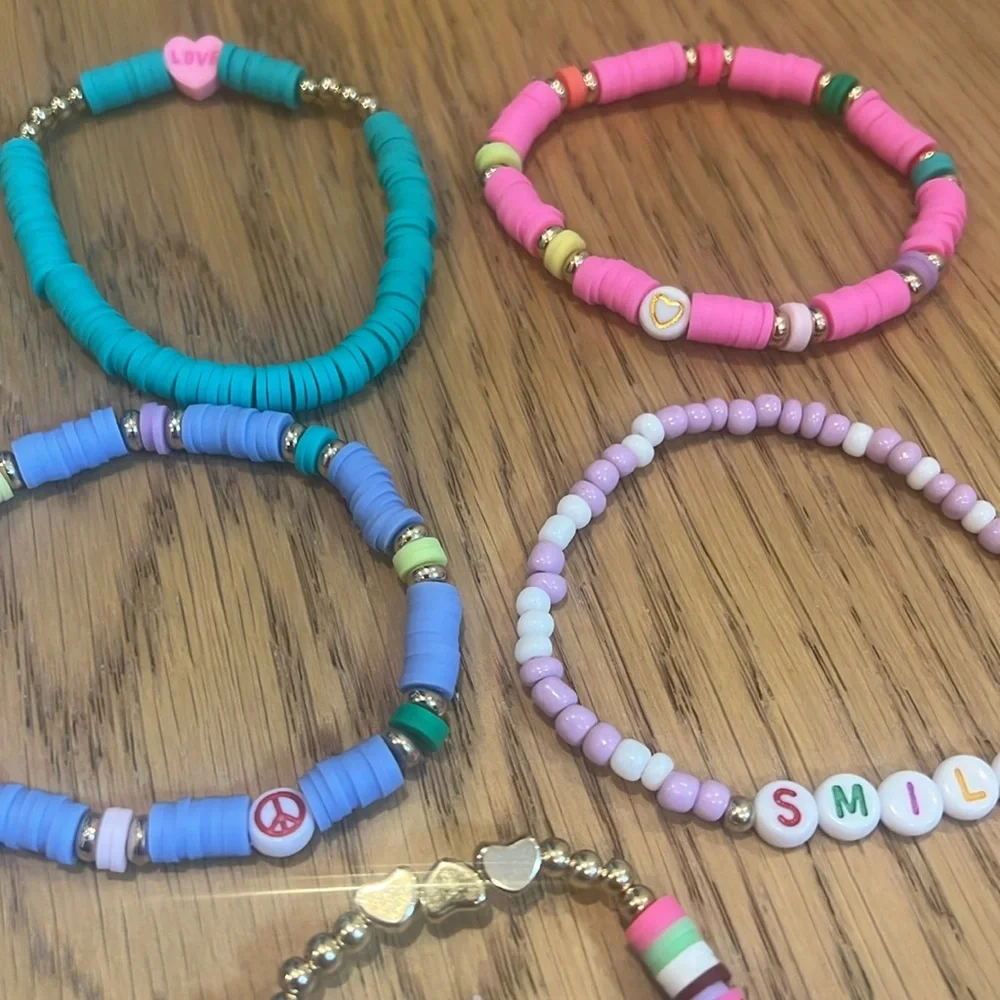 Cheerful set of brightly‎ colored beaded elastic friendship bracelets